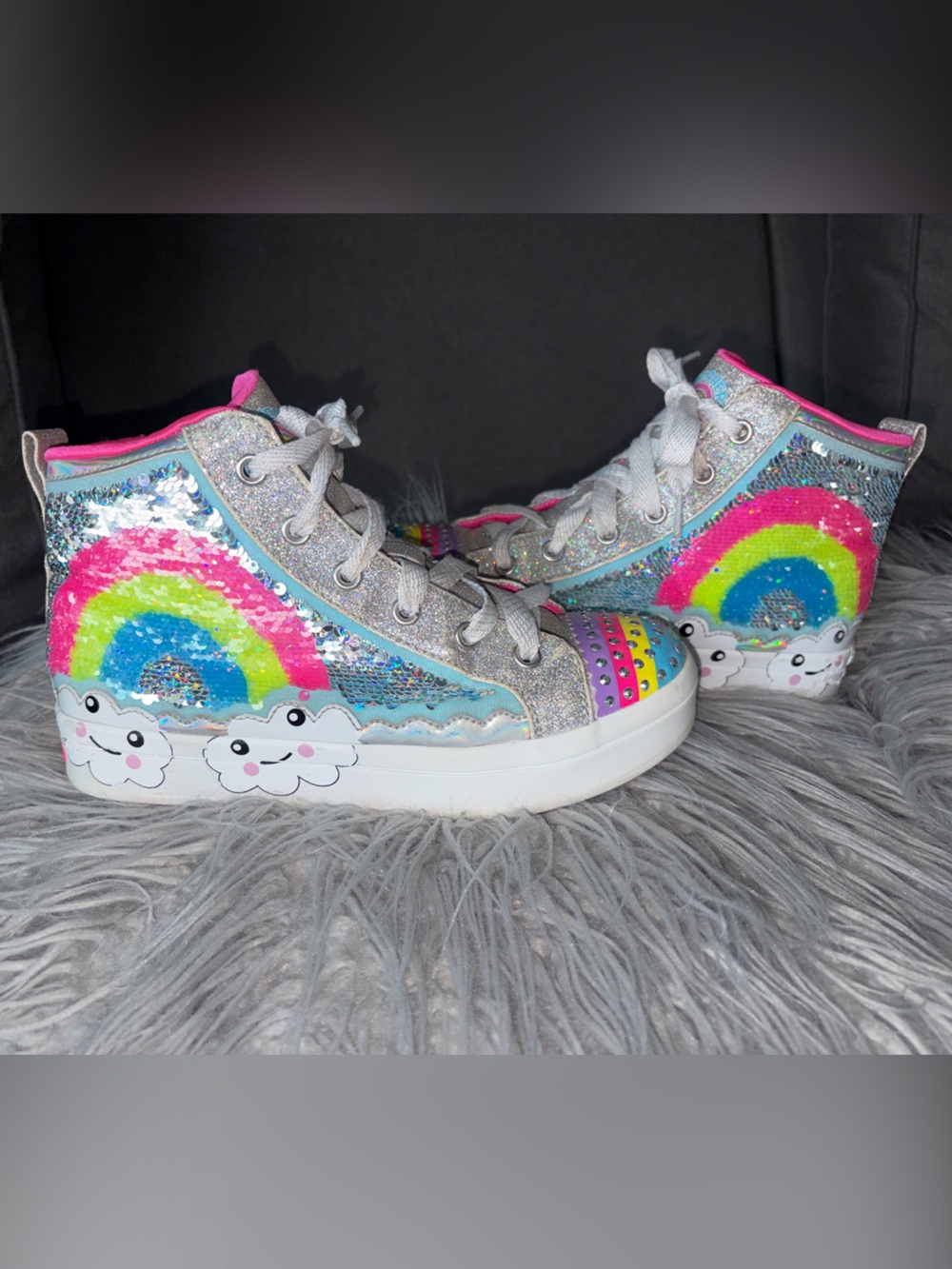 Rainbow flip sequin high top Skechers with side zipper and laces.